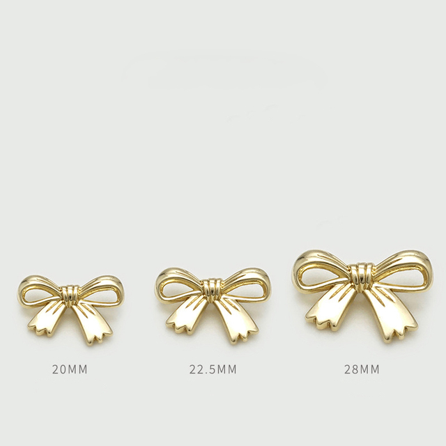 Bottone decorativo con gambo in metallo cavo a forma di fiocco da 20 mm 22,5 mm 28 mm per abbigliamento