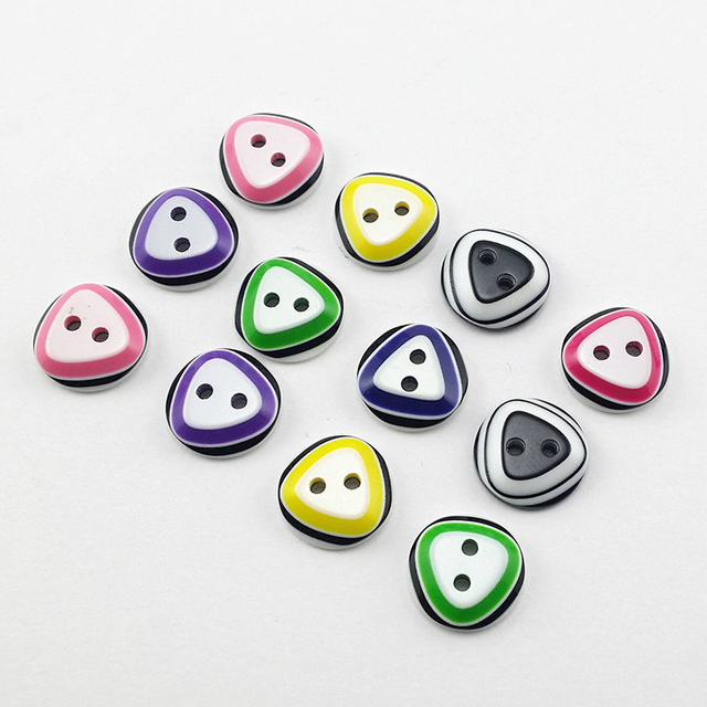 Botones pl&aacute;sticos coloridos de la resina del ojo de pez del agujero de la venta caliente 2 para la ropa de los ni&ntilde;os